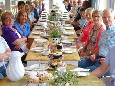 Volunteers enjoying Afternoon Tea